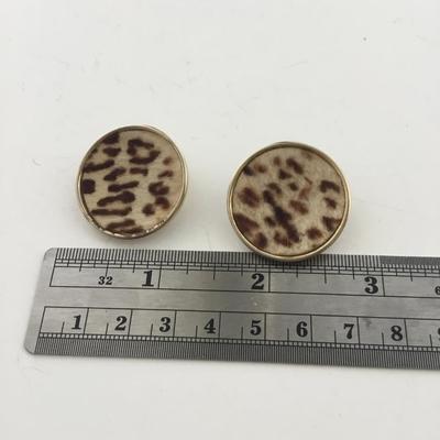 Unmarked fuzzy feel round vintage clip on earrings