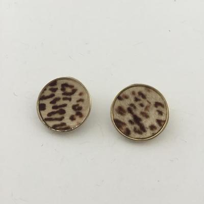 Unmarked fuzzy feel round vintage clip on earrings