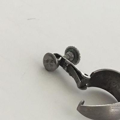 Pat pending silver tone clip on vintage earrings