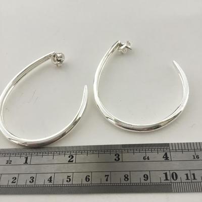 Silver tone hoop earrings