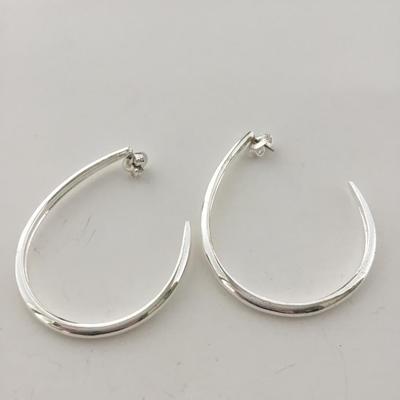 Silver tone hoop earrings
