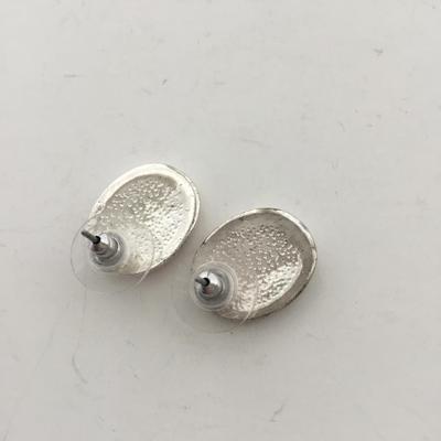 Red oval silver tone stud earrings