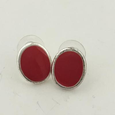 Red oval silver tone stud earrings
