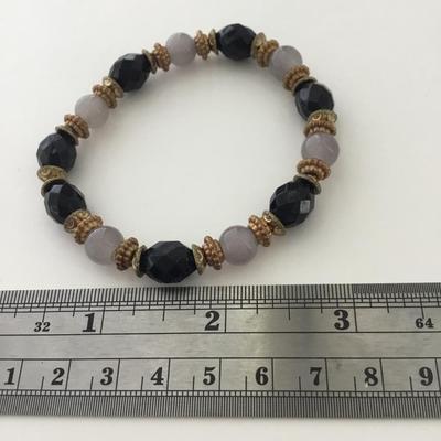 Black and clear like beaded stretchy bracelet