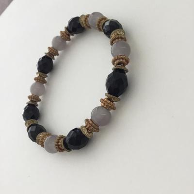 Black and clear like beaded stretchy bracelet