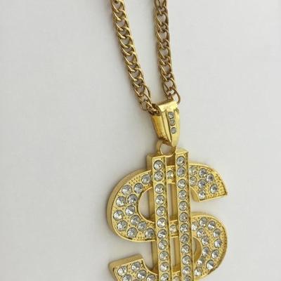 Gold tone money sign statement necklace