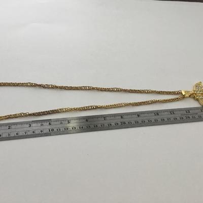Gold tone money sign statement necklace