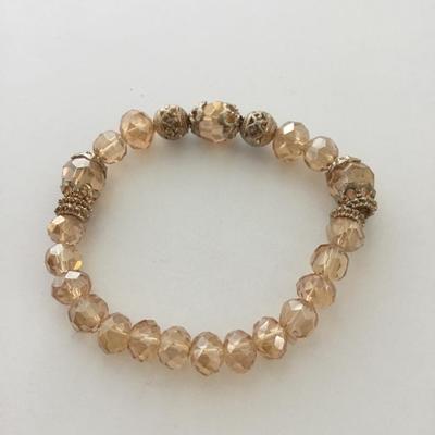 Beautiful champagne color beaded stretchy bracelet