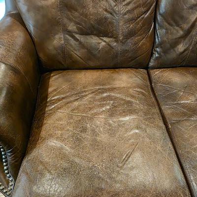 Sale Photo Thumbnail #3: Mocha colored leather couch by Alexander Taylor # 2. 
Measurements are 88 1/2" × 43 1/2."
The seat depth is 26"
 
2 available.  They are exactly the same size. The other sofa is lot 2SS.