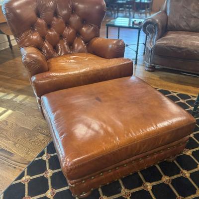 Sale Photo Thumbnail #10: Cognac colored leather club chair with matching ottoman by Henredon. 
Chair measurements: 37"H x 36" wide.
Chair and ottoman only, does not include rug or anything else in pictures.