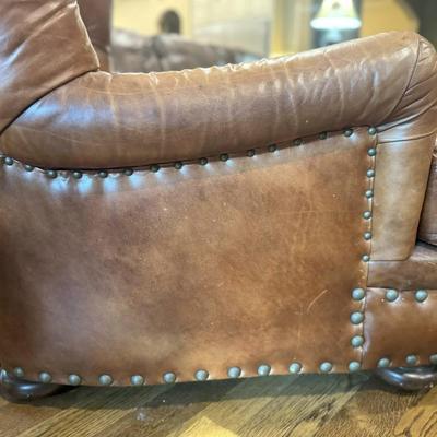 Sale Photo Thumbnail #16: Cognac colored leather club chair with matching ottoman by Henredon. 
Chair measurements: 37"H x 36" wide.
Chair and ottoman only, does not include rug or anything else in pictures.