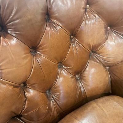 Sale Photo Thumbnail #12: Cognac colored leather club chair with matching ottoman by Henredon. 
Chair measurements: 37"H x 36" wide.
Chair and ottoman only, does not include rug or anything else in pictures.