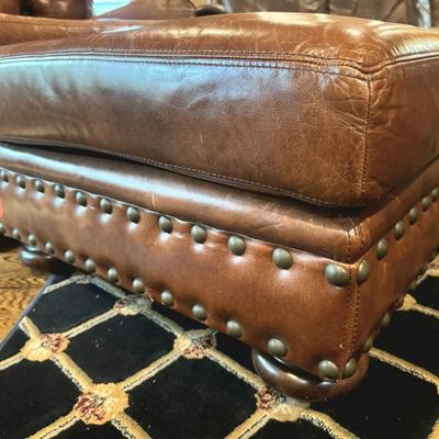 Sale Photo Thumbnail #18: Cognac colored leather club chair with matching ottoman by Henredon. 
Chair measurements: 37"H x 36" wide.
Chair and ottoman only, does not include rug or anything else in pictures.