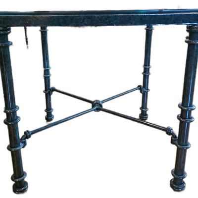 Sale Photo Thumbnail #24: Large dark green iron base with glass top coffee table and matching end table.  Tables only. Does not include rug or anything else in pictures. 

Coffee table measurements: 36" X 36" x16"H

Side table measurements: 20"×20"