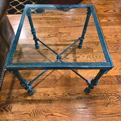 Sale Photo Thumbnail #21: Large dark green iron base with glass top coffee table and matching end table.  Tables only. Does not include rug or anything else in pictures. 

Coffee table measurements: 36" X 36" x16"H

Side table measurements: 20"×20"