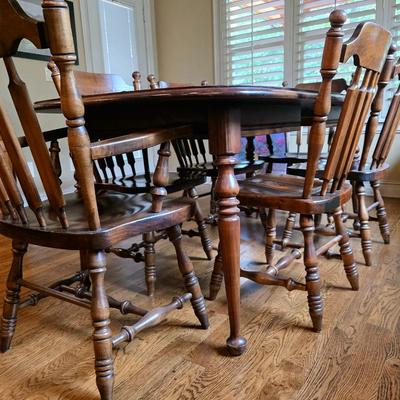 Sale Photo Thumbnail #29: Vintage Dining table set with 6 chairs, 2 are Captain chairs with arms, and 1 leaf by Dixie. 

Measurements: with leaf in 72"L. Without leaf 60".