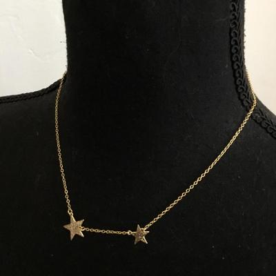 Beautiful gold tone star necklace