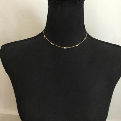 Pretty gold tone Crystal rhinestone necklace. Very nice.