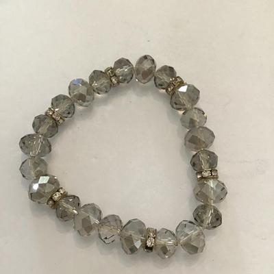 Very nice stretchy bracelet with smoke colored glass Crystal beads