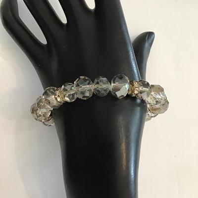 Very nice stretchy bracelet with smoke colored glass Crystal beads