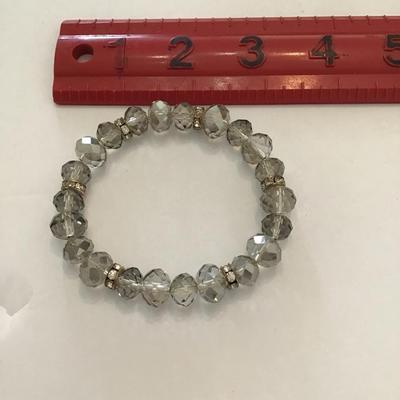 Very nice stretchy bracelet with smoke colored glass Crystal beads