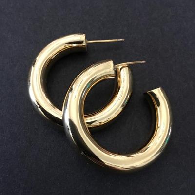 Cute chunky gold tone, hoop earrings very nice