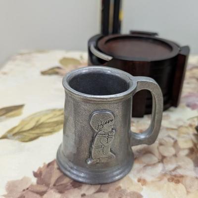 Sale Photo Thumbnail #90: Pewter cup, coasters, vases.