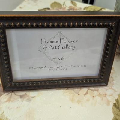 Sale Photo Thumbnail #108: Owl ceramic vase and owl figure decor and picture frame.