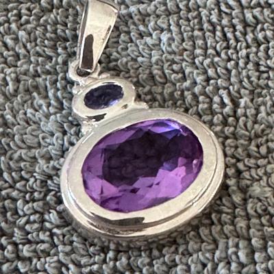 Amethyst pendant, a piece of jewelry featuring the beautiful purple gemstone