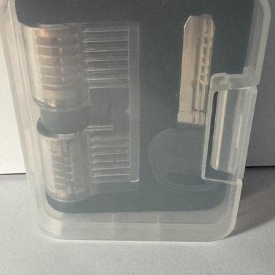 Transparent dimple practice lock set, commonly used for learning and practicing lock picking techniques.