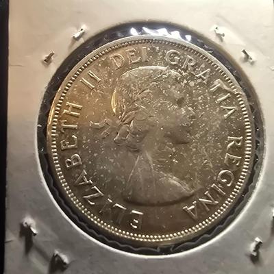 1957 SILVER CANADIAN DOLLAR