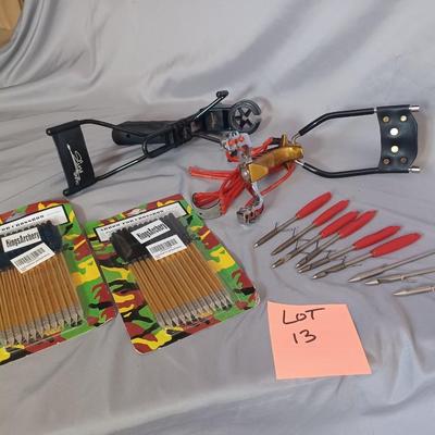 Sale Photo Thumbnail #77: 2 sling shots with 33 arrows and extra bungee.