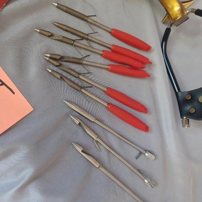 Sale Photo Thumbnail #75: 2 sling shots with 33 arrows and extra bungee.