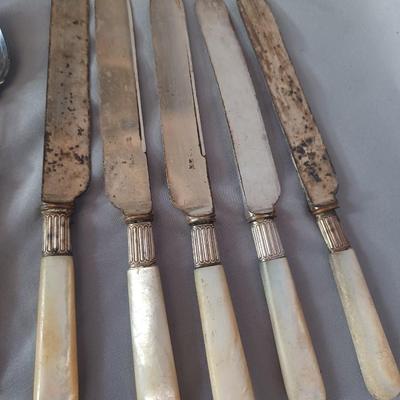 Sale Photo Thumbnail #87: vintage 1900's Mother of Pearl 
silverware pieces and a sterling Lunt curved spoon