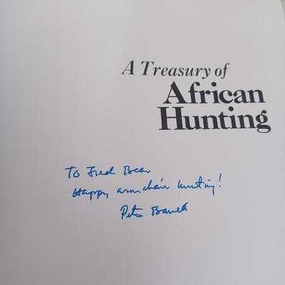 Sale Photo Thumbnail #101: Vintage Books: owned by Fred Bear:
 A Treasury of African Hunting by Peter Barrett 
Weapons by Edwin Tunis 
Triggernometry by Eugene Cunnigham Ed McGiverns Book on Fast and Fancy Revolver shooting 
Hell on Ice by Commander Edward Ellsbeeg 
Shots at Whitet