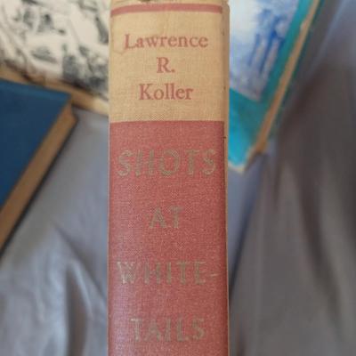 Sale Photo Thumbnail #110: Vintage Books: owned by Fred Bear:
 A Treasury of African Hunting by Peter Barrett 
Weapons by Edwin Tunis 
Triggernometry by Eugene Cunnigham Ed McGiverns Book on Fast and Fancy Revolver shooting 
Hell on Ice by Commander Edward Ellsbeeg 
Shots at Whitet