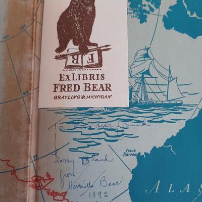 Sale Photo Thumbnail #112: Vintage Books: owned by Fred Bear:
 A Treasury of African Hunting by Peter Barrett 
Weapons by Edwin Tunis 
Triggernometry by Eugene Cunnigham Ed McGiverns Book on Fast and Fancy Revolver shooting 
Hell on Ice by Commander Edward Ellsbeeg 
Shots at Whitet