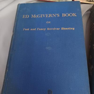 Sale Photo Thumbnail #116: Vintage Books: owned by Fred Bear:
 A Treasury of African Hunting by Peter Barrett 
Weapons by Edwin Tunis 
Triggernometry by Eugene Cunnigham Ed McGiverns Book on Fast and Fancy Revolver shooting 
Hell on Ice by Commander Edward Ellsbeeg 
Shots at Whitet