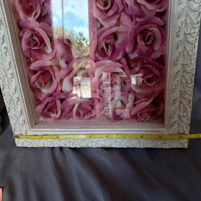 Sale Photo Thumbnail #146: 2-shadow box picture frames with flowers inside. One is white and the other 
is off-white.