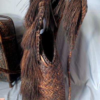 Sale Photo Thumbnail #151: 2 Very old and rare backpacks. The smaller one is a Vintage Japanese Trail Basket/backpack. The taller one is a Ifugo Hunters Phillipino Backpack from 1850's.