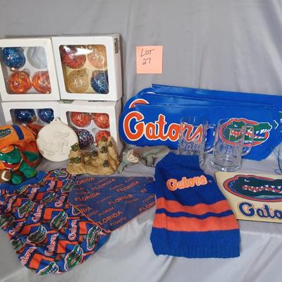Sale Photo Thumbnail #160: Gator items. Ornaments, dog clothes, mugs, decor. 18 items