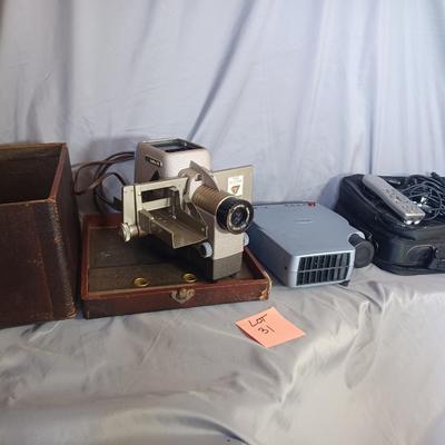 Sale Photo Thumbnail #186: 2 Projectors. Vintage TDC Selectron Semimatic with original Box and a Mitsubishi LVP-SD10U with the bag and remote. Also a Pana-vue automatic
