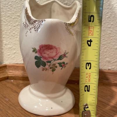 Floral pillowcases, vase and hostess book
