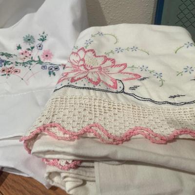 Floral pillowcases, vase and hostess book