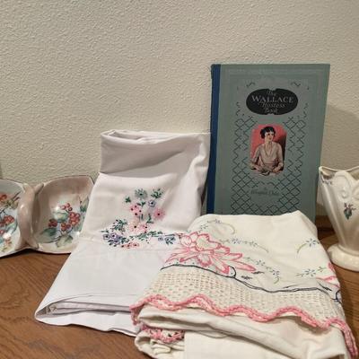 Floral pillowcases, vase and hostess book