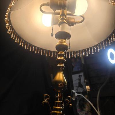 BRASS BASE DOUBLE LIGHTED LAMP, VANITY MIRROR, 2 NECKLACES AND A PURSE