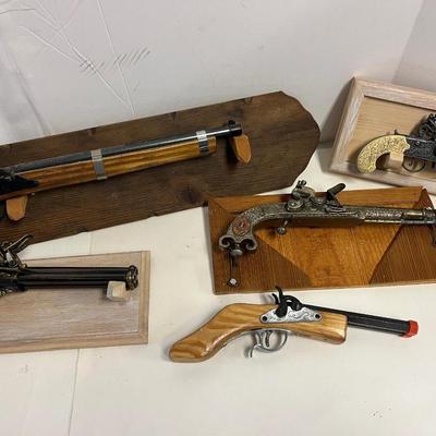 Replica Firearms and Mounts.