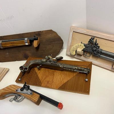 Replica Firearms and Mounts.