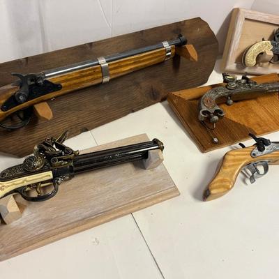 Replica Firearms and Mounts.