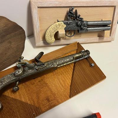 Replica Firearms and Mounts.